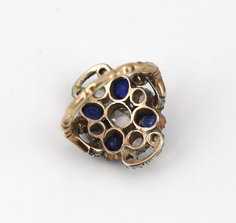 An antique gold and silver, sapphire and rose cut diamond cluster set dress ring